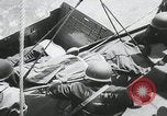 Image of German prisoners carry wounded Saint Mere Eglise France, 1944, second 54 stock footage video 65675080724