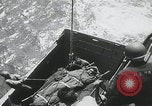 Image of German prisoners carry wounded Saint Mere Eglise France, 1944, second 56 stock footage video 65675080724