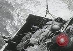 Image of German prisoners carry wounded Saint Mere Eglise France, 1944, second 58 stock footage video 65675080724
