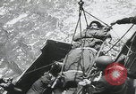 Image of German prisoners carry wounded Saint Mere Eglise France, 1944, second 59 stock footage video 65675080724