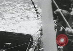 Image of German prisoners carry wounded Saint Mere Eglise France, 1944, second 60 stock footage video 65675080724