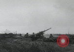 Image of US artillery firing Normandy France, 1944, second 2 stock footage video 65675080726