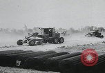 Image of plane landing Normandy France, 1944, second 9 stock footage video 65675080730