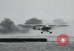Image of plane landing Normandy France, 1944, second 12 stock footage video 65675080730