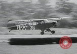 Image of plane landing Normandy France, 1944, second 15 stock footage video 65675080730