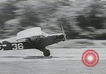 Image of plane landing Normandy France, 1944, second 17 stock footage video 65675080730