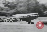 Image of plane landing Normandy France, 1944, second 18 stock footage video 65675080730