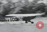 Image of plane landing Normandy France, 1944, second 19 stock footage video 65675080730