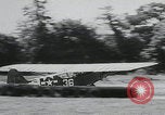 Image of plane landing Normandy France, 1944, second 20 stock footage video 65675080730