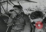 Image of plane landing Normandy France, 1944, second 24 stock footage video 65675080730