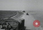 Image of pontoon bridge crossing France, 1944, second 2 stock footage video 65675080731