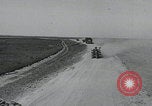 Image of pontoon bridge crossing France, 1944, second 4 stock footage video 65675080731