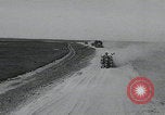 Image of pontoon bridge crossing France, 1944, second 5 stock footage video 65675080731