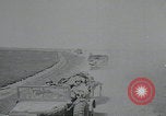 Image of pontoon bridge crossing France, 1944, second 13 stock footage video 65675080731