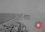 Image of pontoon bridge crossing France, 1944, second 14 stock footage video 65675080731