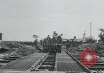 Image of pontoon bridge crossing France, 1944, second 17 stock footage video 65675080731