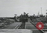 Image of pontoon bridge crossing France, 1944, second 18 stock footage video 65675080731