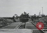 Image of pontoon bridge crossing France, 1944, second 19 stock footage video 65675080731