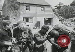 Image of French firemen Carentan France, 1944, second 62 stock footage video 65675080732