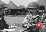 Image of US soldiers receive Francs United Kingdom, 1944, second 8 stock footage video 65675080735