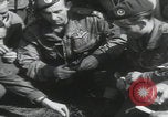 Image of soldier getting haircut United Kingdom, 1944, second 2 stock footage video 65675080737
