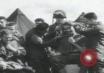 Image of soldier getting haircut United Kingdom, 1944, second 13 stock footage video 65675080737