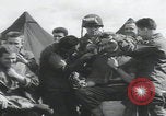 Image of soldier getting haircut United Kingdom, 1944, second 14 stock footage video 65675080737