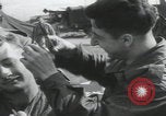 Image of soldier getting haircut United Kingdom, 1944, second 19 stock footage video 65675080737