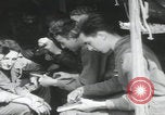 Image of soldier getting haircut United Kingdom, 1944, second 26 stock footage video 65675080737