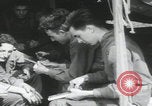 Image of soldier getting haircut United Kingdom, 1944, second 27 stock footage video 65675080737