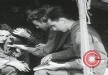 Image of soldier getting haircut United Kingdom, 1944, second 28 stock footage video 65675080737