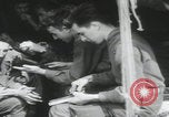 Image of soldier getting haircut United Kingdom, 1944, second 29 stock footage video 65675080737