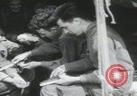 Image of soldier getting haircut United Kingdom, 1944, second 32 stock footage video 65675080737