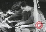 Image of soldier getting haircut United Kingdom, 1944, second 34 stock footage video 65675080737