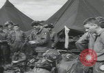 Image of soldier getting haircut United Kingdom, 1944, second 36 stock footage video 65675080737
