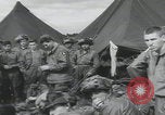 Image of soldier getting haircut United Kingdom, 1944, second 38 stock footage video 65675080737