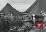 Image of soldier getting haircut United Kingdom, 1944, second 40 stock footage video 65675080737