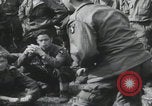 Image of soldier getting haircut United Kingdom, 1944, second 58 stock footage video 65675080737