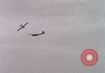 Image of Waco gliders landing Holland Netherlands, 1944, second 32 stock footage video 65675080744