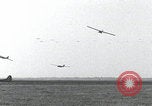 Image of Waco gliders landing Holland Netherlands, 1944, second 44 stock footage video 65675080744