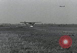 Image of gliders landing Holland Netherlands, 1944, second 16 stock footage video 65675080746