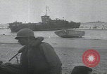 Image of Beach landing Normandy France, 1944, second 59 stock footage video 65675080763