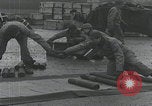Image of US troops pack mortar shells England United Kingdom, 1944, second 22 stock footage video 65675080773