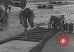 Image of US troops pack mortar shells England United Kingdom, 1944, second 38 stock footage video 65675080773