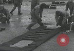 Image of US troops pack mortar shells England United Kingdom, 1944, second 46 stock footage video 65675080773