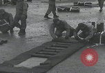 Image of US troops pack mortar shells England United Kingdom, 1944, second 48 stock footage video 65675080773