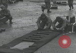 Image of US troops pack mortar shells England United Kingdom, 1944, second 49 stock footage video 65675080773