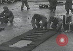 Image of US troops pack mortar shells England United Kingdom, 1944, second 51 stock footage video 65675080773