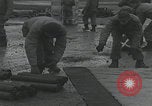 Image of American soldiers packing mortars England United Kingdom, 1944, second 13 stock footage video 65675080774