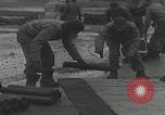 Image of American soldiers packing mortars England United Kingdom, 1944, second 14 stock footage video 65675080774